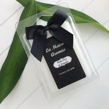 Load image into Gallery viewer, Made with love, our cruelty-free, vegan wax is hand-poured to create smooth and creamy melts that are both highly scented and long-lasting. Our six-piece clamshell melts are available in our full range of fragrances, packaged in recycled materials and dressed in an elegant black bow.